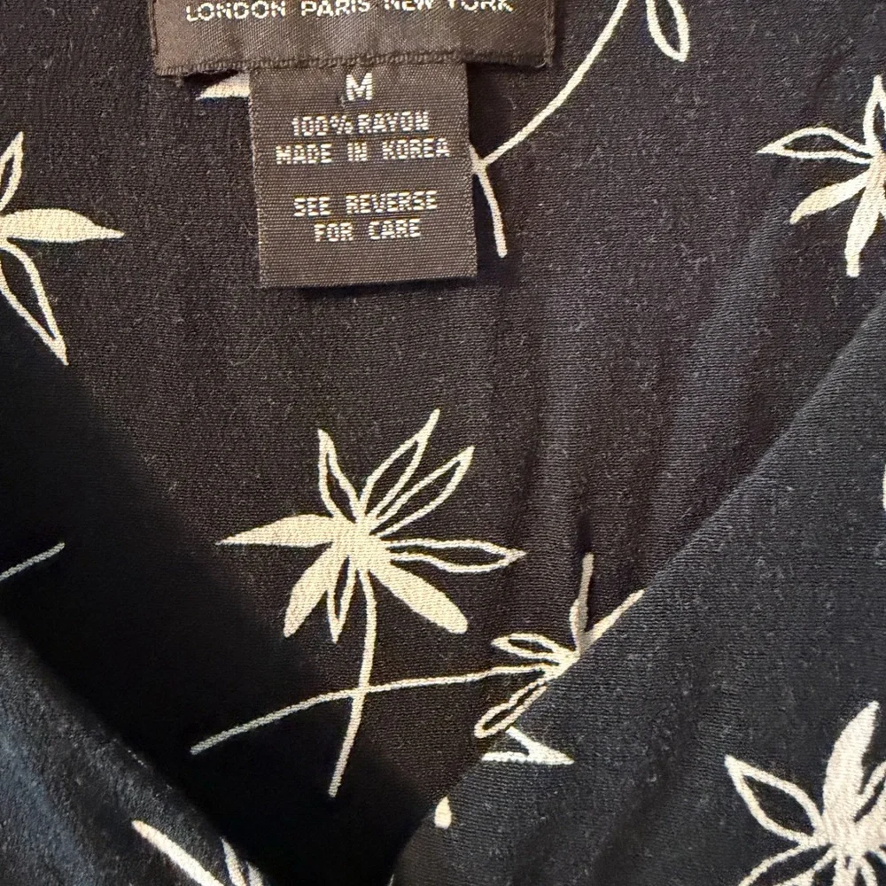 Limited Black Floral Button Front Tie Back Romper Medium